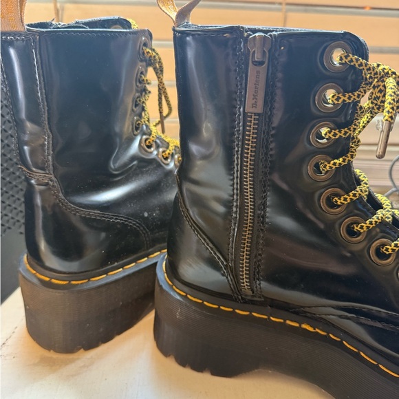 $80 Firm 
Dr. Martens Black Patent Platform Combat Boots with Yellow Laces - Picture 2 of 5